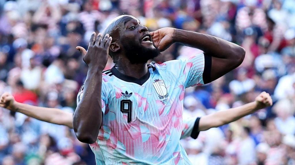Belgium players celebrate after scoring against USA in the World Cup last 16
