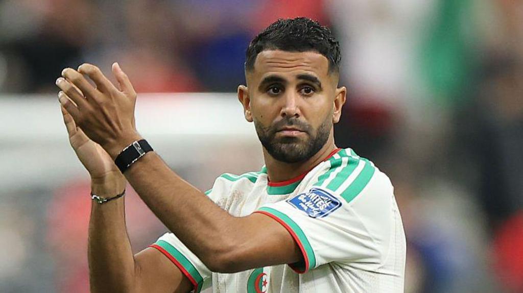 Riyad Mahrez walks off the pitch after Algeria's World Cup exit against Switzerland
