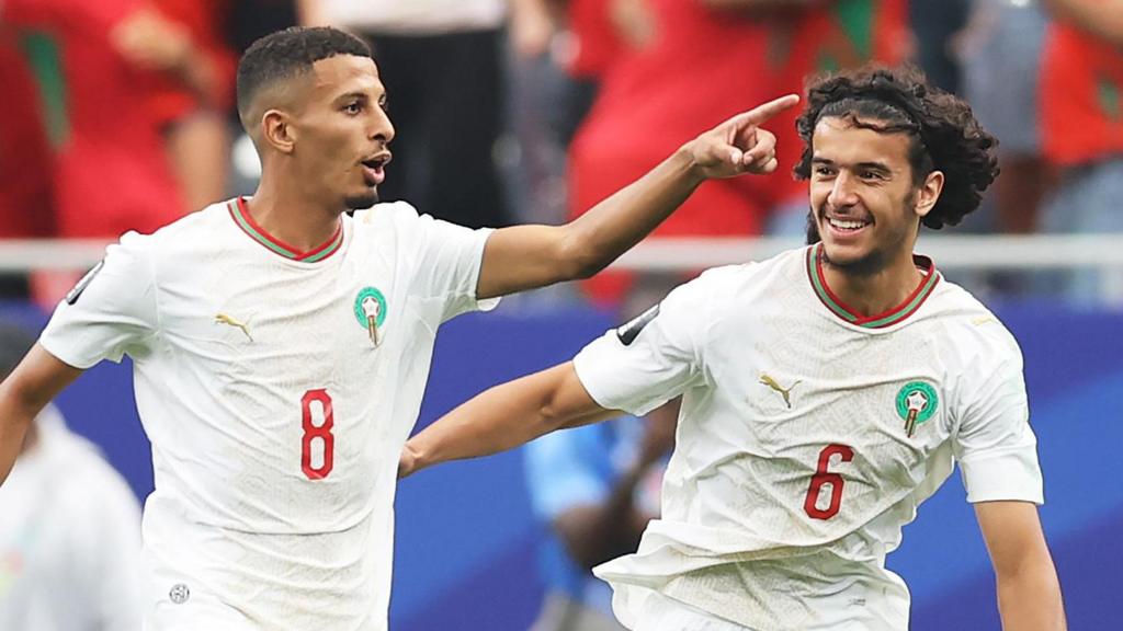Morocco players celebrate after beating Canada 3-0 to reach the World Cup quarter-finals